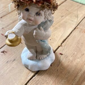 Charming Cherub Figurine with Gold Accent